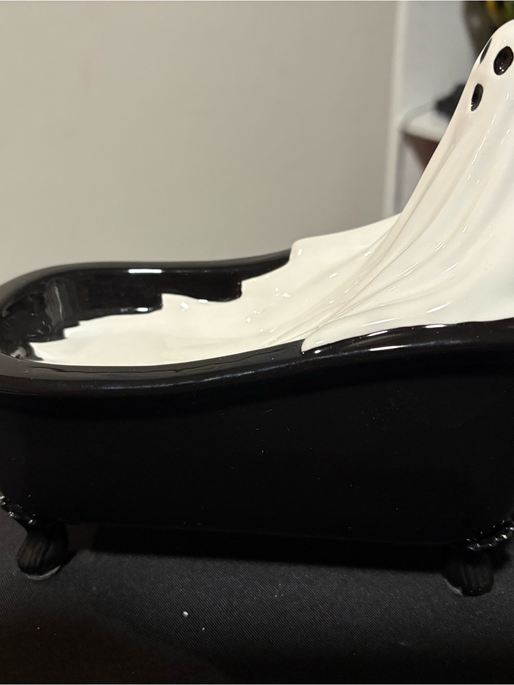 Scentsy wax warmer Ceramic Black & White Ghost soaking in a Bathtub